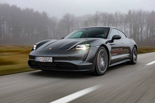 Black Porsche Running fast On Road