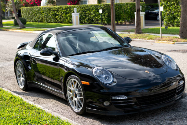 A Porsche 911 Turbo S parked on a road