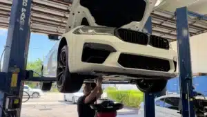 German Car Depot Hollywood FL technician doing expert luxury vehicle repair.